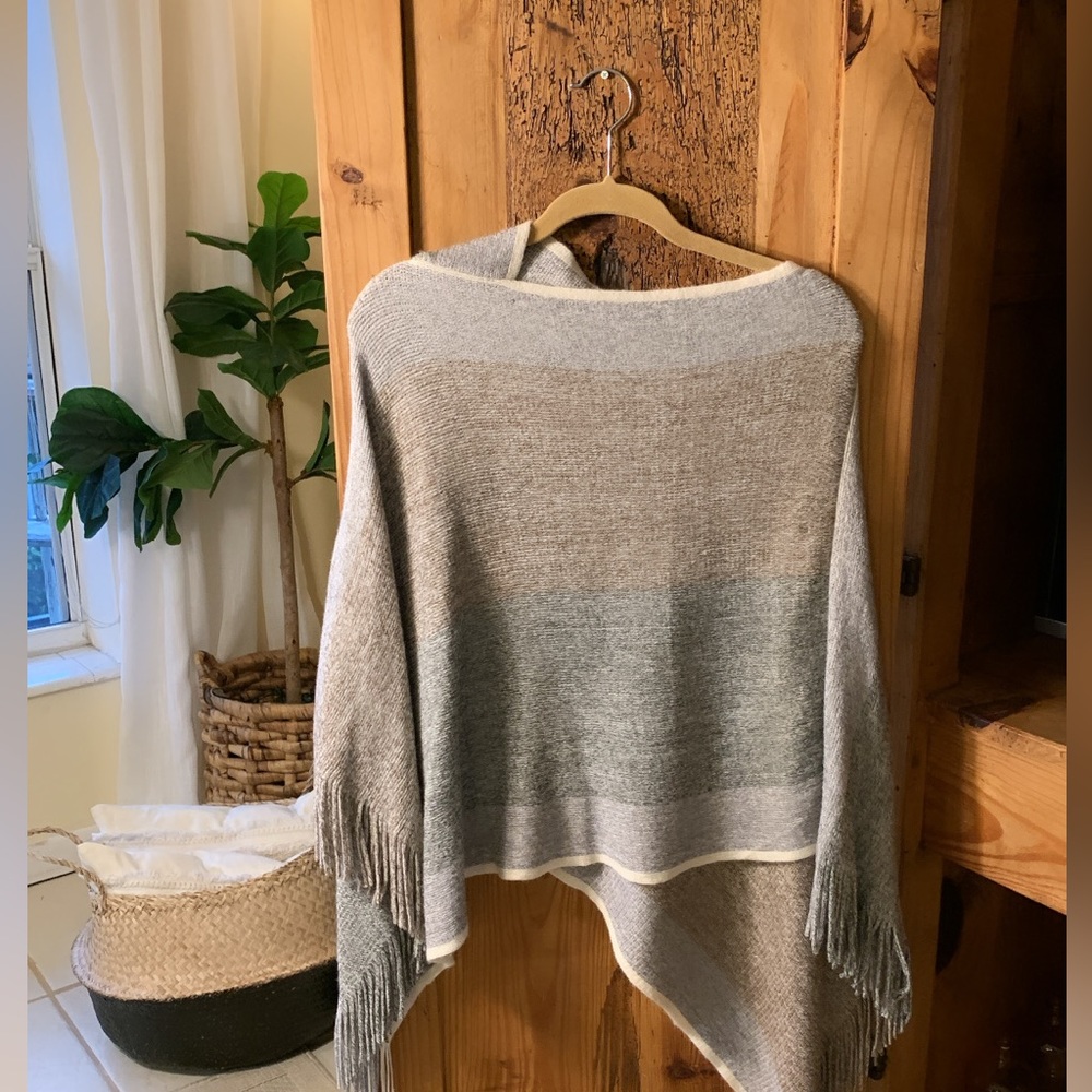 Sweater poncho, worn only once! Looks and feels brand new!